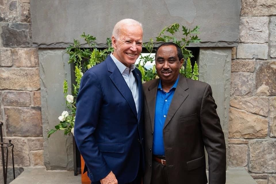 Osman Ahmed with Joe Biden.