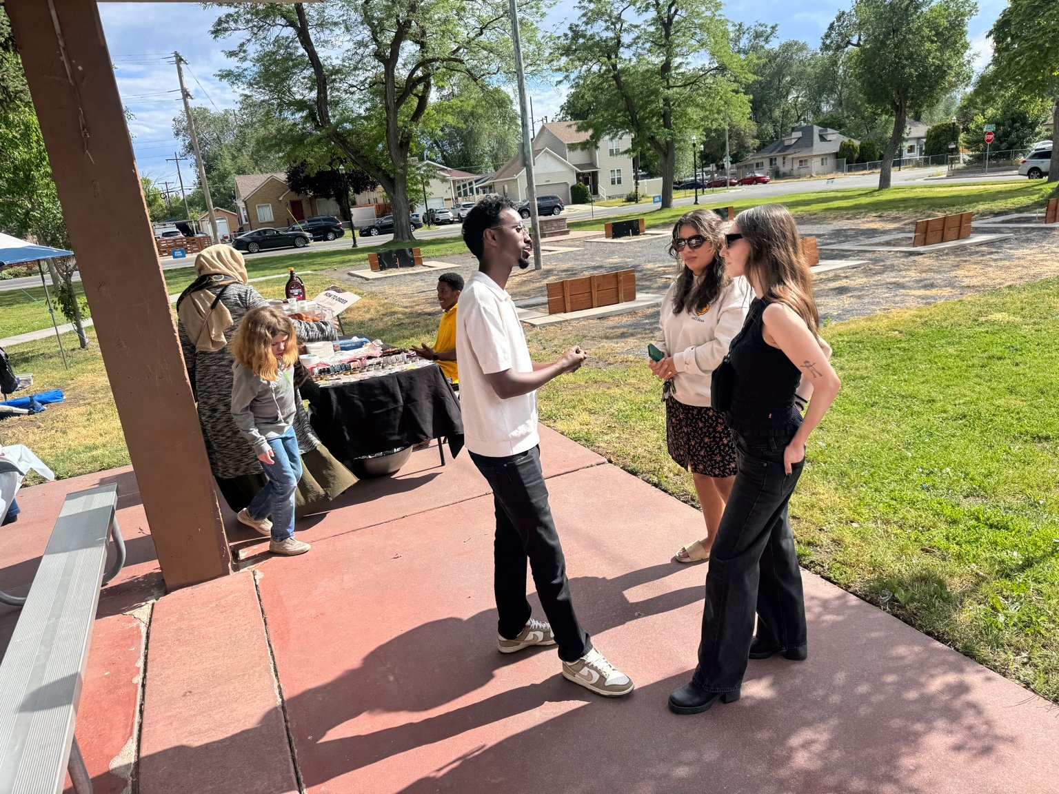 Liban Mohamed, who ran for the United States Congress in Utah, speaking with community members.